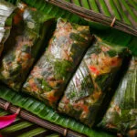 Instant Pot Palusami served in ti leaves with island decor